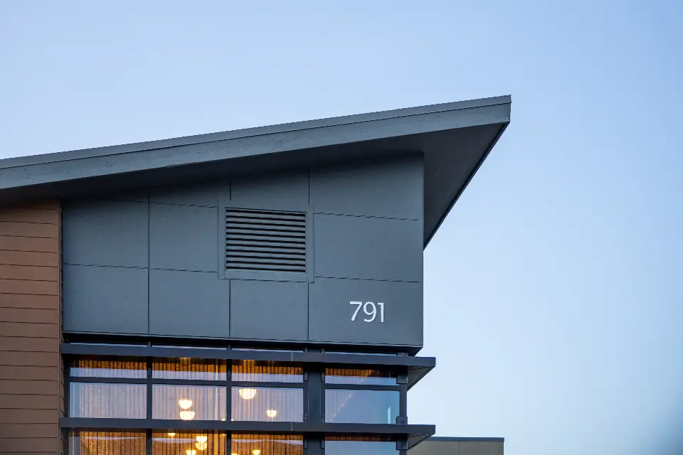 Modern home exterior against a clear sky