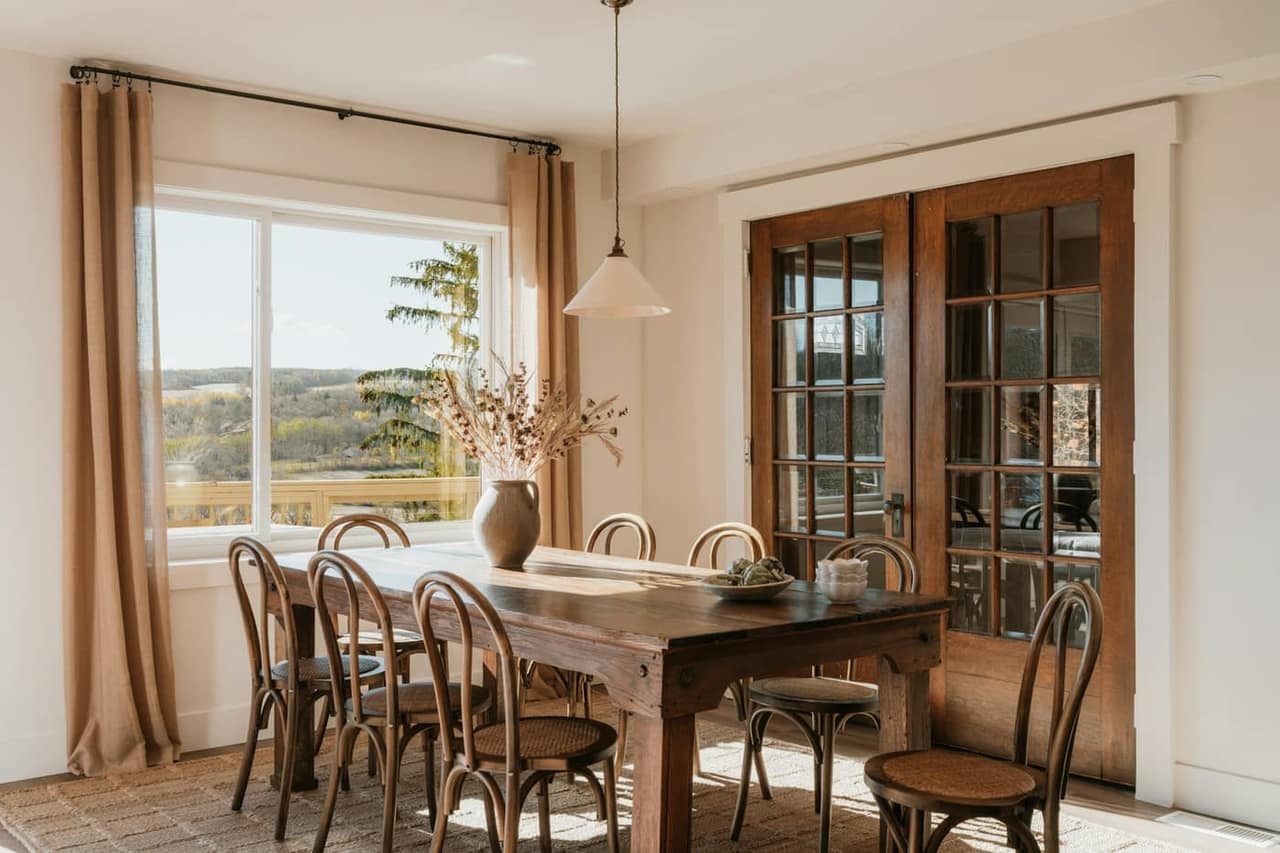 Sunlit dining room staged for sale