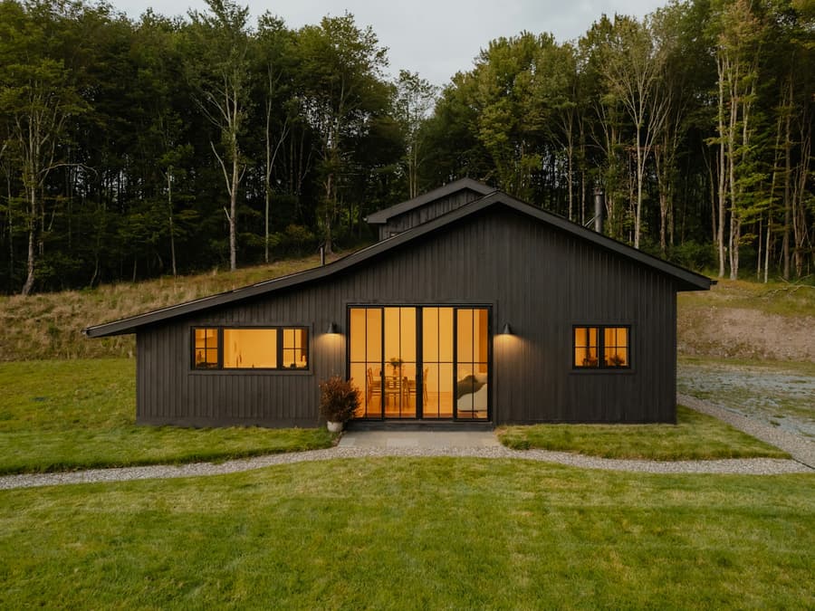 Single-level modern home with glass walls