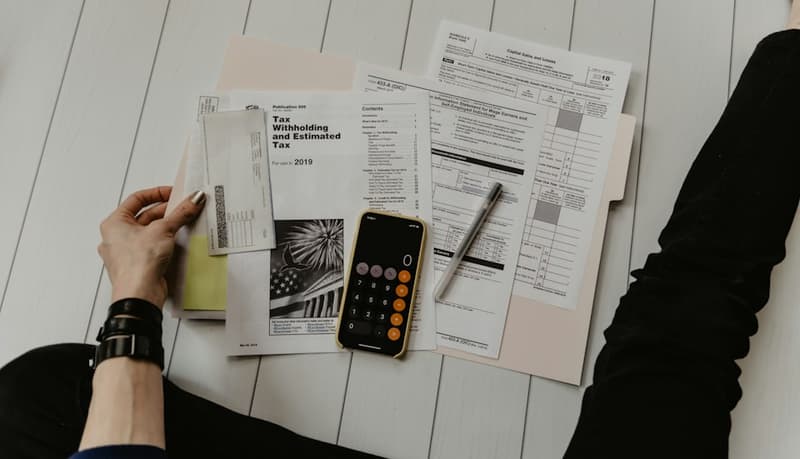 Mortgage paperwork and a calculator