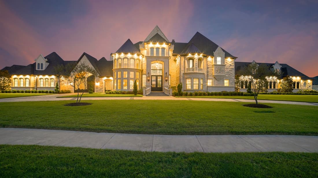Elegant home glowing at dusk