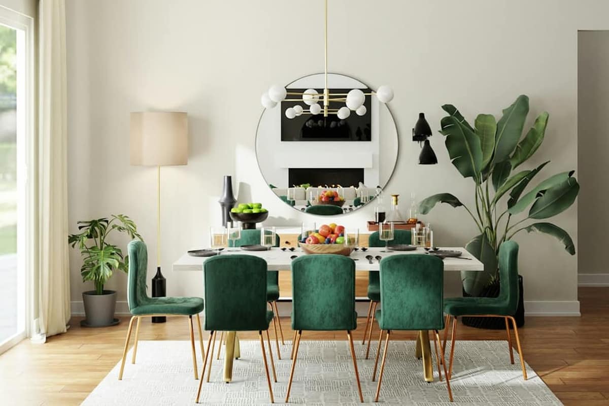 Dining room with green velvet chairs