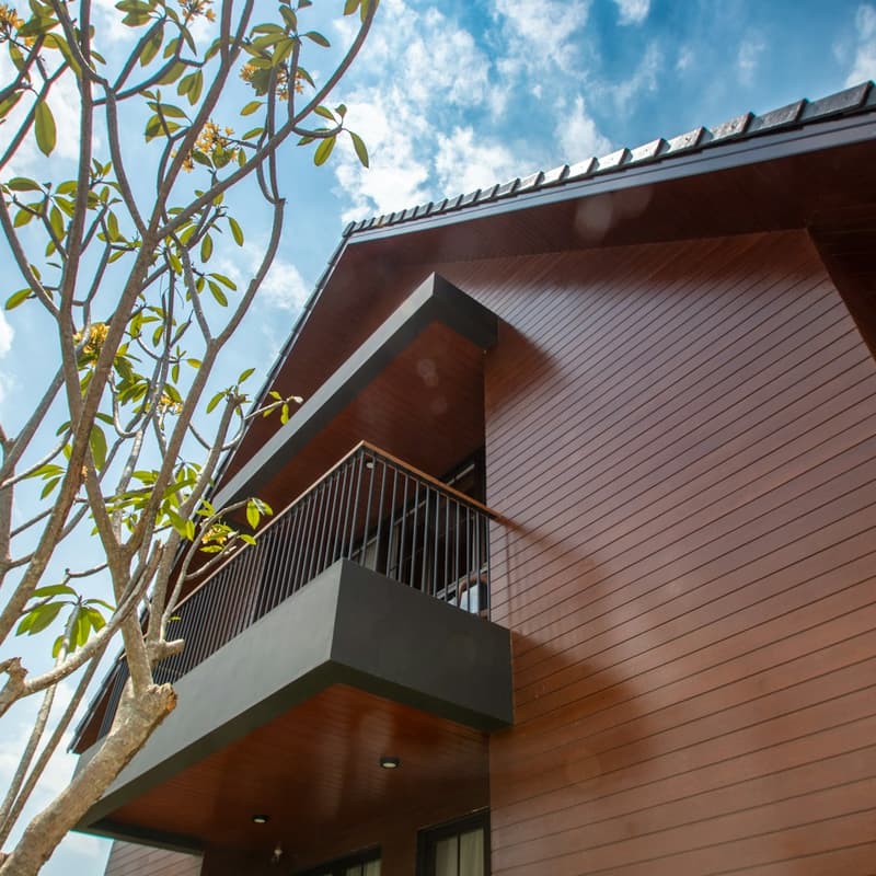 Contemporary home with warm wood facade